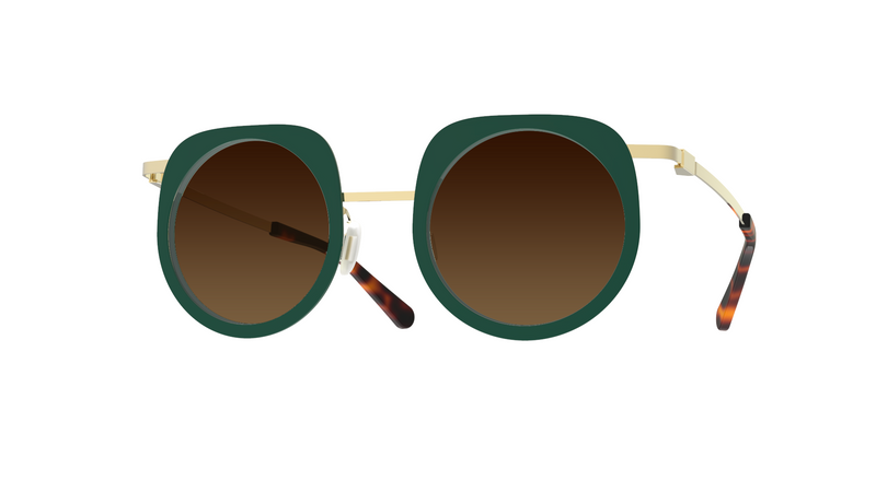 Hublot eyewear by Gamine NYC, from the LAB Collection, featuring metal and acetate inserts with an arty, original shape. Green and gold, gradient brown lenses