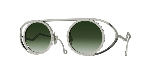 Lunettes de soleil créateur Gamine x Persta, en titane léger et plaqué or, alliant confort et style haut de gamme. Designer Gamine x Persta glasses, featuring lightweight titanium and gold plating, combining comfort and high-end style. Trends summer 2024 vintage