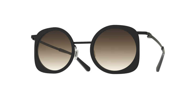 Unique Hublot sunglasses by Gamine NYC, featuring an artistic shape with metal and acetate details. Black on black sunglasses