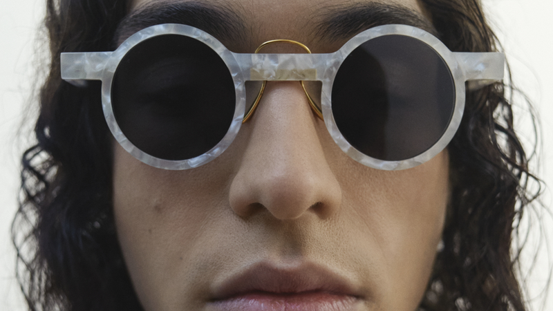 Discover the minimalist elegance of Fushimi sunglasses by Gamine NYC, featuring tiny round acetate frames and a gold-plated nose bridge. Mother of pearl white acetate. Lunettes de soleil blanches. 